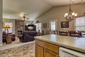 a kitchen and living room with a living room at Lee's Creekside in Pigeon Forge