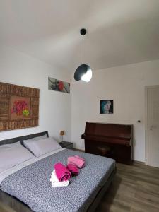 Ένα ή περισσότερα κρεβάτια σε δωμάτιο στο Rosdani Apartment