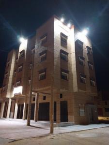 a large building with lights on top of it at Casa Salvador 1 boujdour in Cabo Bojador
