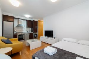 Η κουζίνα ή μικρή κουζίνα στο Estilo en calle Brasil by CABANA Rentals