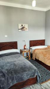 Postel nebo postele na pokoji v ubytování Laila's Home
