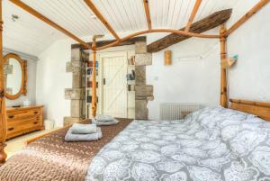 Ένα ή περισσότερα κρεβάτια σε δωμάτιο στο Finest Retreats - Town End Barn