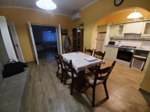 A kitchen or kitchenette at Sándor Apartman