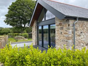 Aed väljaspool majutusasutust The Lake House , luxury rural retreat