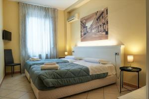 Postel nebo postele na pokoji v ubytování SMART HOTEL + 37 fotografií