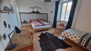 Postel nebo postele na pokoji v ubytování Maison 1902