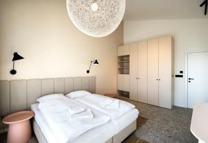 A bed or beds in a room at Natur Resort