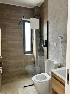Bilik mandi di Pensiunea Apartamente 9 Baile Felix Otto 101