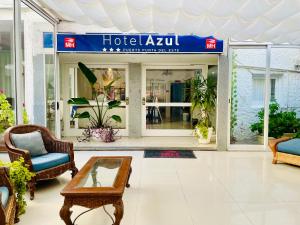 a store front with a table in front of it at Hotel Azul by MH in Punta del Este