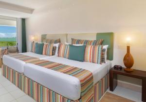 Postel nebo postele na pokoji v ubytování Grand Oasis Palm - All inclusive