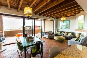 a living room with a couch and a table at Villa Jade in San Miguel de Allende