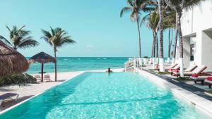 Bazén v ubytování The Sens Tulum Riviera by Oasis nebo v jeho okolí + 37 fotografií