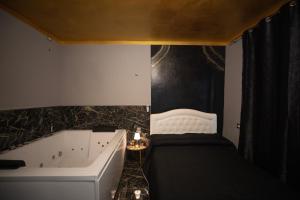 Postel nebo postele na pokoji v ubytování Suite Relax 1