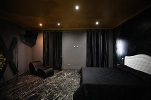 Postel nebo postele na pokoji v ubytování Suite Relax 1