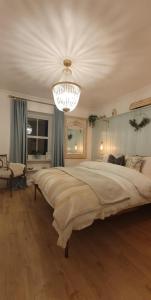 En eller flere senge i et værelse på Beatrice Cottage + 7 billeder