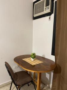 Телевизор и/или развлекательный центр в Hotel Herrera