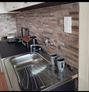 Kuchyň nebo kuchyňský kout v ubytování Apartman 053 + 3 fotografie