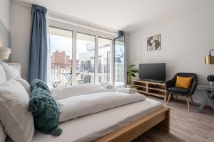 Posteľ alebo postele v izbe v ubytovaní River Sunshine Apartment