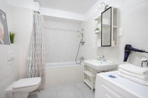 Kúpeľňa v ubytovaní River Sunshine Apartment + 11 fotografií