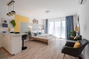 Posteľ alebo postele v izbe v ubytovaní River Sunshine Apartment