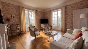 TV o dispositivi per l'intrattenimento presso Maison d'hôtes Le Parc