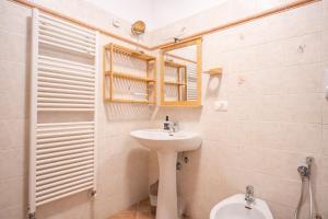 Koupelna v ubytování La Corte della Fontana + 11 fotografií