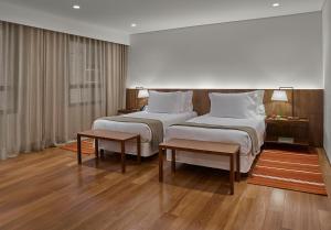 Cama ou camas em um quarto em Hotel Fasano Belo Horizonte