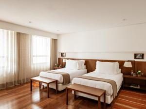 Cama ou camas em um quarto em Hotel Fasano Belo Horizonte