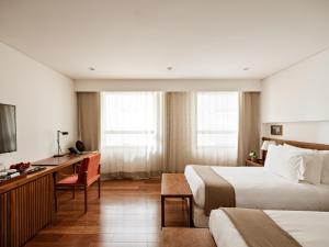 Cama ou camas em um quarto em Hotel Fasano Belo Horizonte