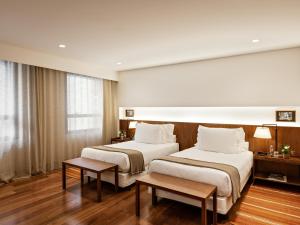 Cama ou camas em um quarto em Hotel Fasano Belo Horizonte