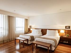 Cama ou camas em um quarto em Hotel Fasano Belo Horizonte