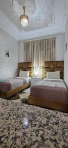 Postel nebo postele na pokoji v ubytování Dar Tetuan 4 YOU I