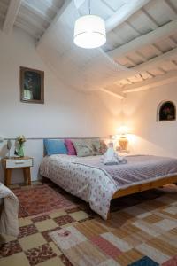 a bedroom with a bed in a room at Masia Cal Fuster in Joanet