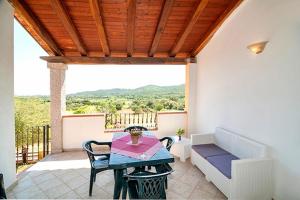 Μπαλκόνι ή βεράντα στο ISA-Residence with swimming pool near Budoni