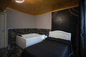 Postel nebo postele na pokoji v ubytování Suite Relax 1