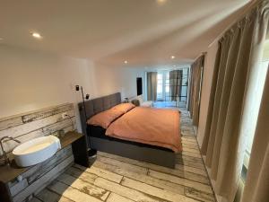 Postelja oz. postelje v sobi nastanitve vitalpha lodge