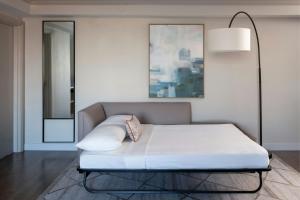 Ένα ή περισσότερα κρεβάτια σε δωμάτιο στο St. Petersburg Marriott Clearwater