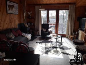 Posezení v ubytování L'Ard'Heure D'Avance chalet familiale