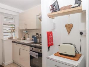 Kuchyň nebo kuchyňský kout v ubytování Pie Cottage