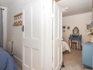 Postel nebo postele na pokoji v ubytování Pie Cottage