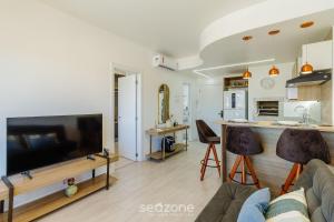 Η κουζίνα ή μικρή κουζίνα στο AIR - Apartamentos bem localizados em Porto Alegre/RS +46 φωτογραφίες