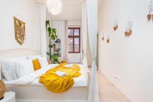 Postel nebo postele na pokoji v ubytování Central Cozy Gateway