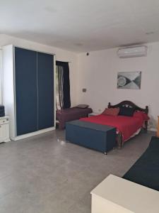 Ένα ή περισσότερα κρεβάτια σε δωμάτιο στο Finca de los abuelos