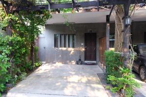 a house with a car parked in front of it at บ้านณัฐวรรณ หัวหิน Zone B - Baan Nattawan Huahin Zone B in Hua Hin +32 photos