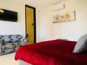 Ένα ή περισσότερα κρεβάτια σε δωμάτιο στο Hotel Boutique Embrujo Hechizo