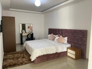Postel nebo postele na pokoji v ubytování Residencial Ru-B