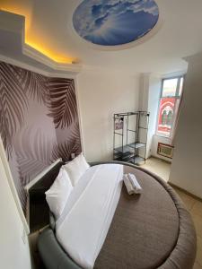 Postel nebo postele na pokoji v ubytování SSA 33 Hotel