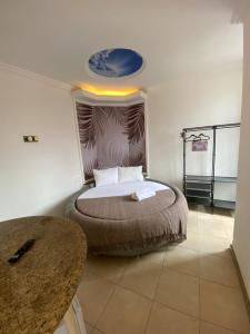 Postel nebo postele na pokoji v ubytování SSA 33 Hotel
