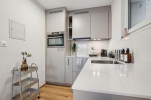 Kuchyň nebo kuchyňský kout v ubytování INN JOY Apartments - Cozy Ski Oase + 8 fotografií