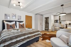 Postelja oz. postelje v sobi nastanitve INN JOY Apartments - Cozy Ski Oase